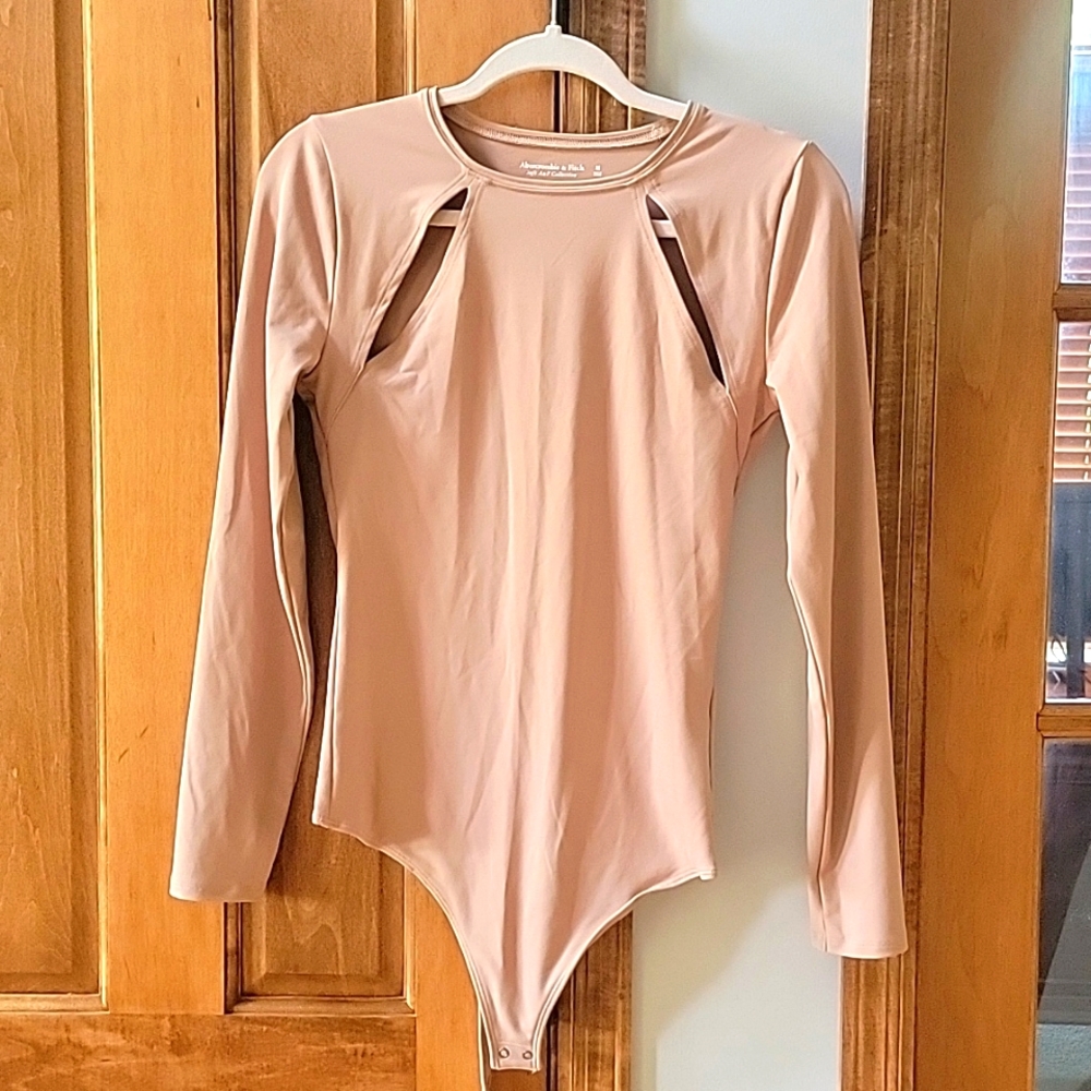 Abercrombie & Fitch tan bodysuit with cutouts. Worn once szM